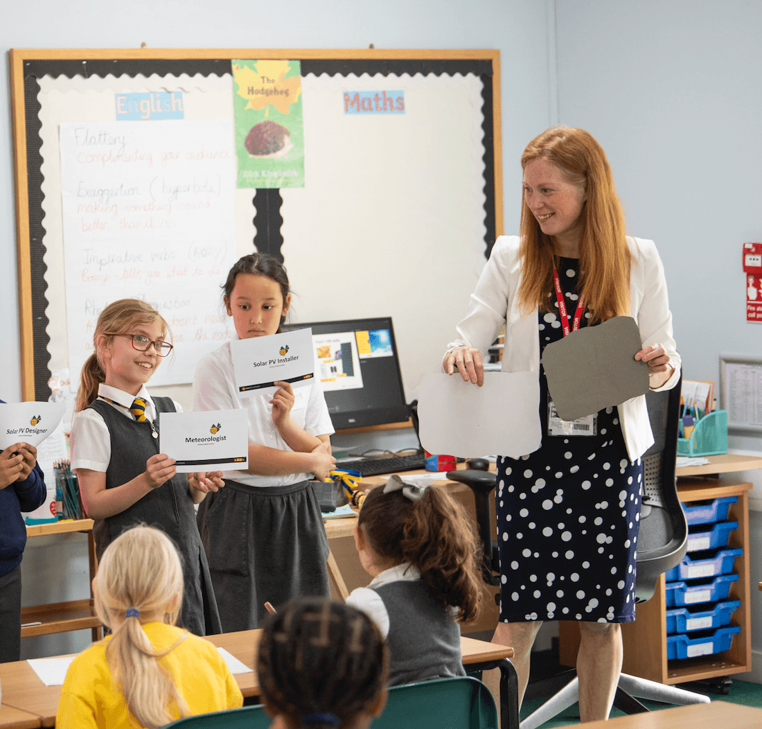 Wendy with students at Churchfields Junior School