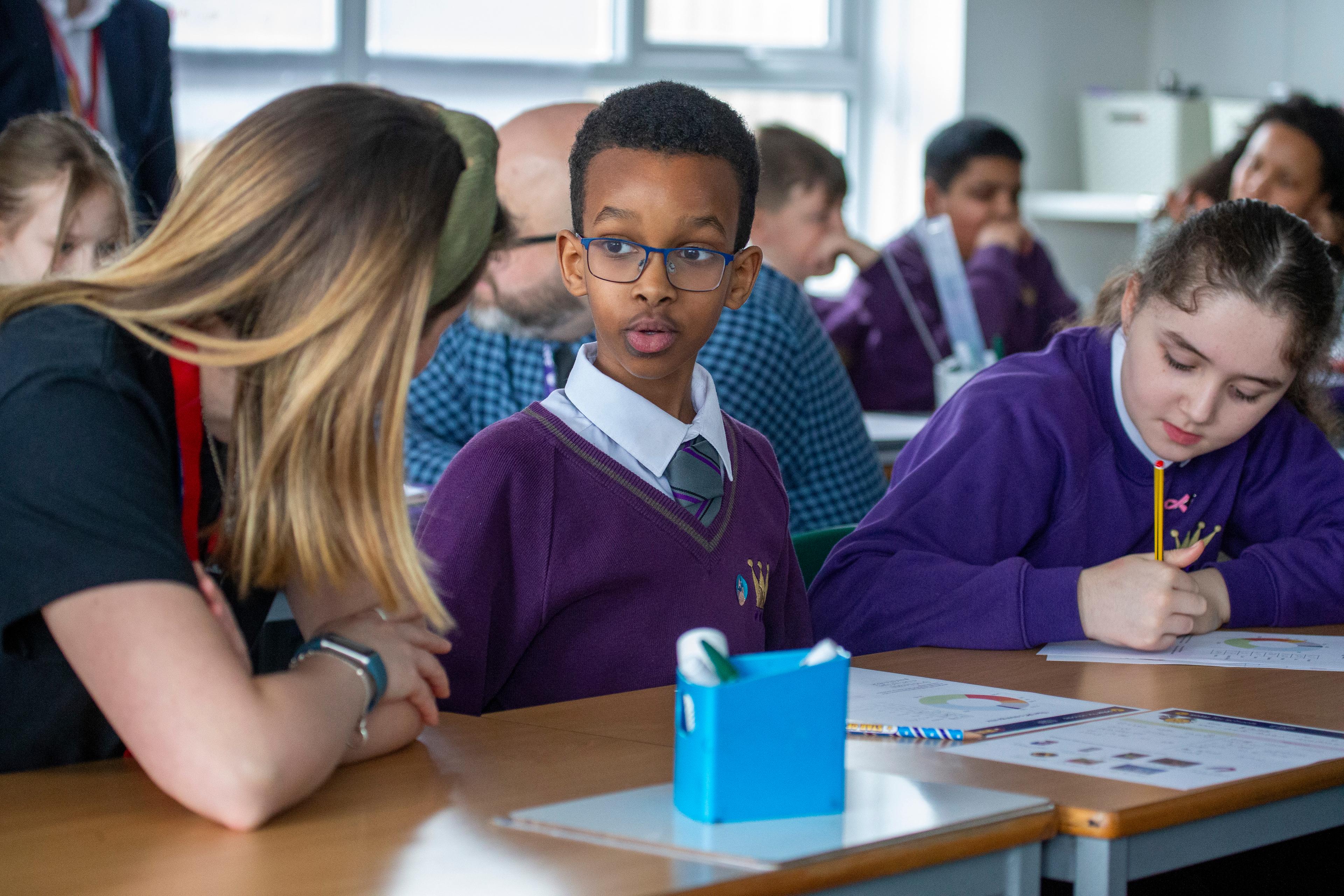 Ellie Patey, from National Grid, talks to pupils from Ark Kings Academy about energy